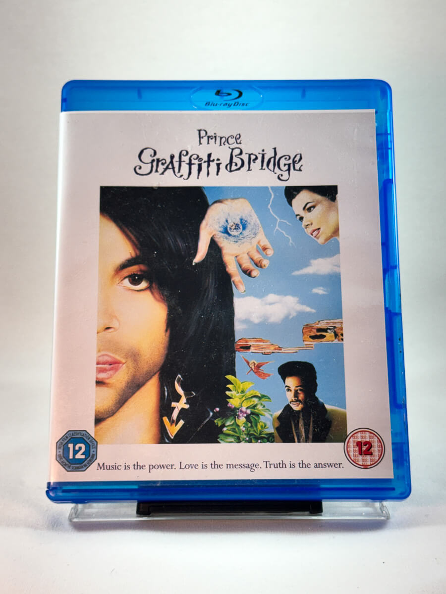 Forside av Blu-ray-cover til Prince – Graffiti Bridge, bruktfilm hos nettbutikken Brukbar Film