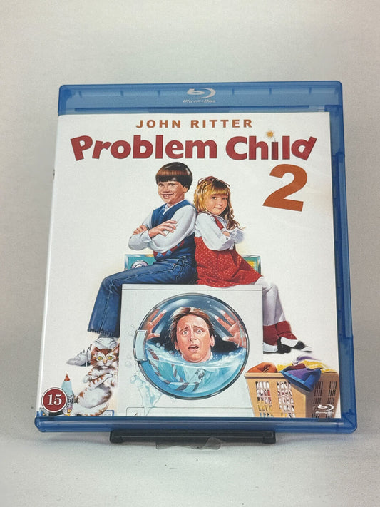 Forside av Blu-ray-cover til Problem Child 2 – oppfølgeren til komediesuksessen med John Ritter, brukt Blu-ray hos Brukbar Film.