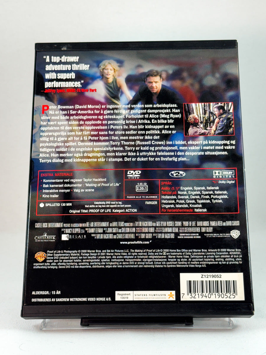 Bakside av DVD-cover til Proof of Life, detaljert produktbilde av brukt DVD-utgivelse hos Brukbar Film.
