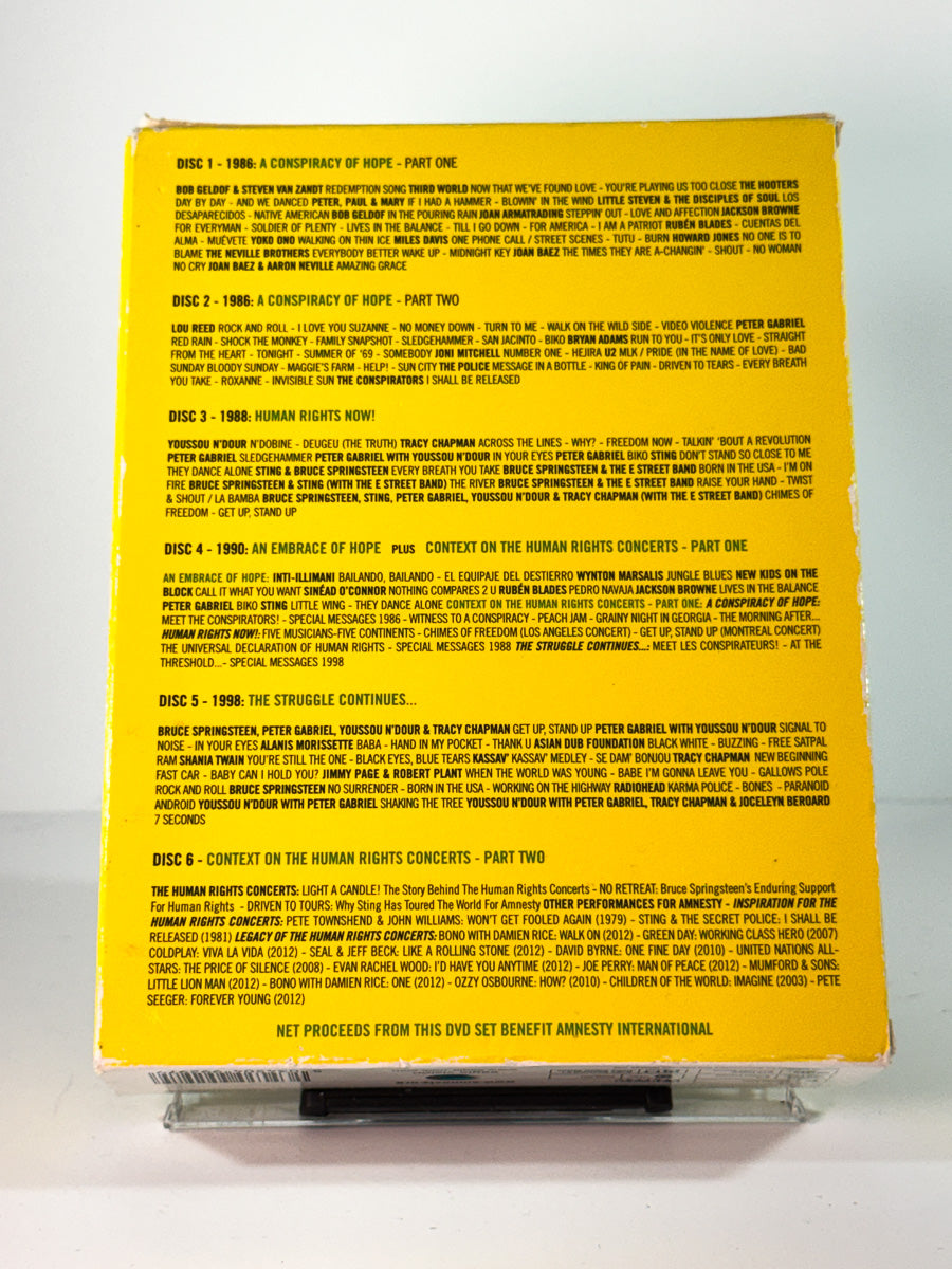 Bakside av cover til released the human rights concerts 1986 1998, brukt original DVD hos Brukbar Film