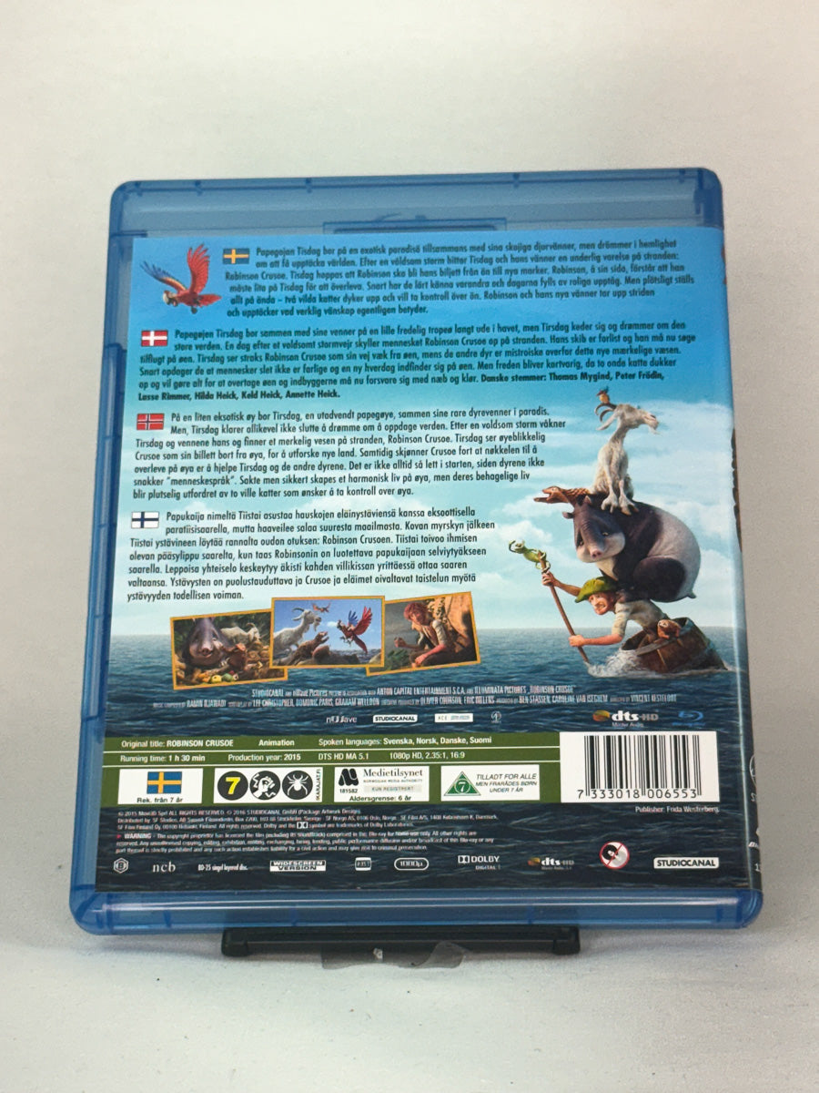 Bakside av Blu-ray-cover til Robinson Crusoe – brukt Blu-ray med språkvalg (norsk, svensk, dansk, finsk), Brukbar Film