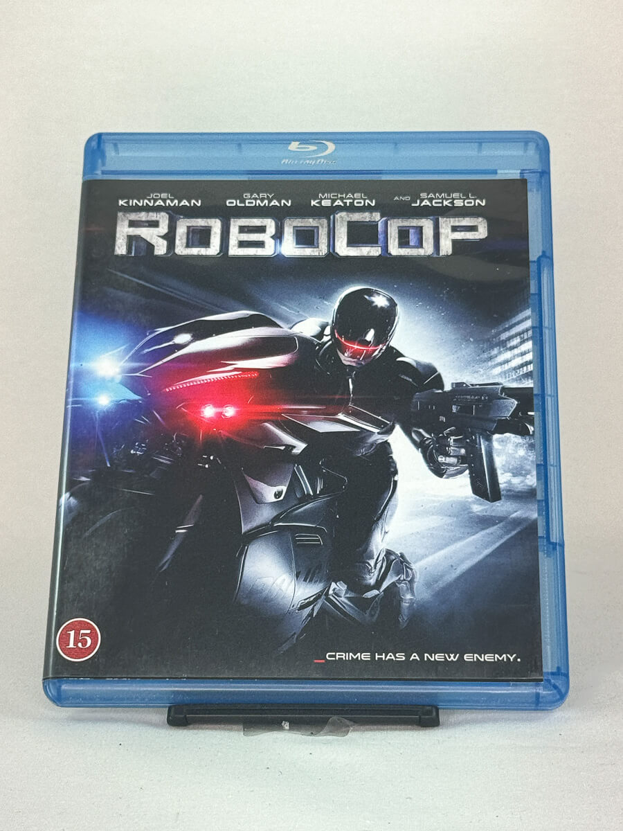 Forside av Blu-ray-cover til RoboCop (2014) – nyinnspilling med Joel Kinnaman og Gary Oldman, brukt sci-fi-film hos Brukbar Film.
