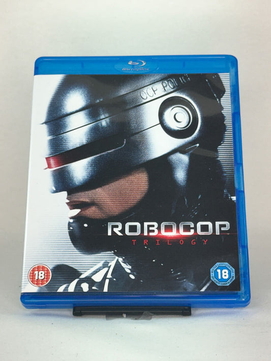 Forside av Blu-ray-cover for RoboCop Trilogy – actionklassikerne samlet i én boks, brukt Blu-ray hos Brukbar Film.
