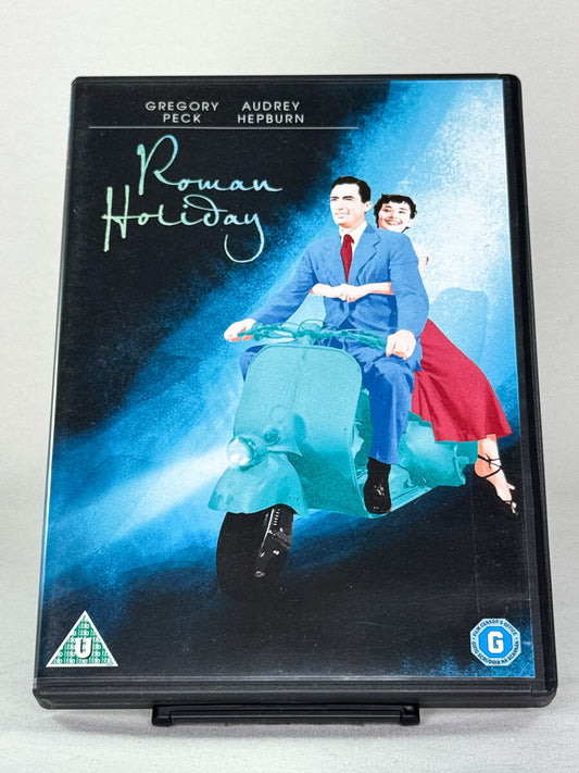 Forside av DVD-cover til Roman Holiday – klassisk romantisk film med Audrey Hepburn, brukt DVD fra Brukbar Film.