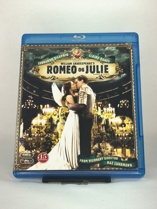 Forside av Blu-ray-cover til Romeo og Julie – Baz Luhrmanns moderne tolkning av Shakespeares klassiker med Leonardo DiCaprio og Claire Danes, brukt Blu-ray hos Brukbar Film.