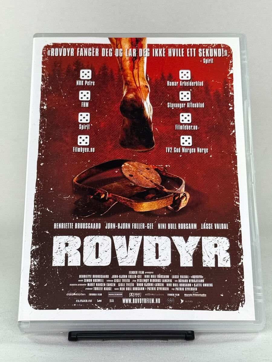 Forside av DVD-cover til Rovdyr – brutal norsk grøsser regissert av Patrik Syversen med Nini Bull Robsahm og Jørn Bjørn Fuller-Gee – brukt DVD hos Brukbar Film.