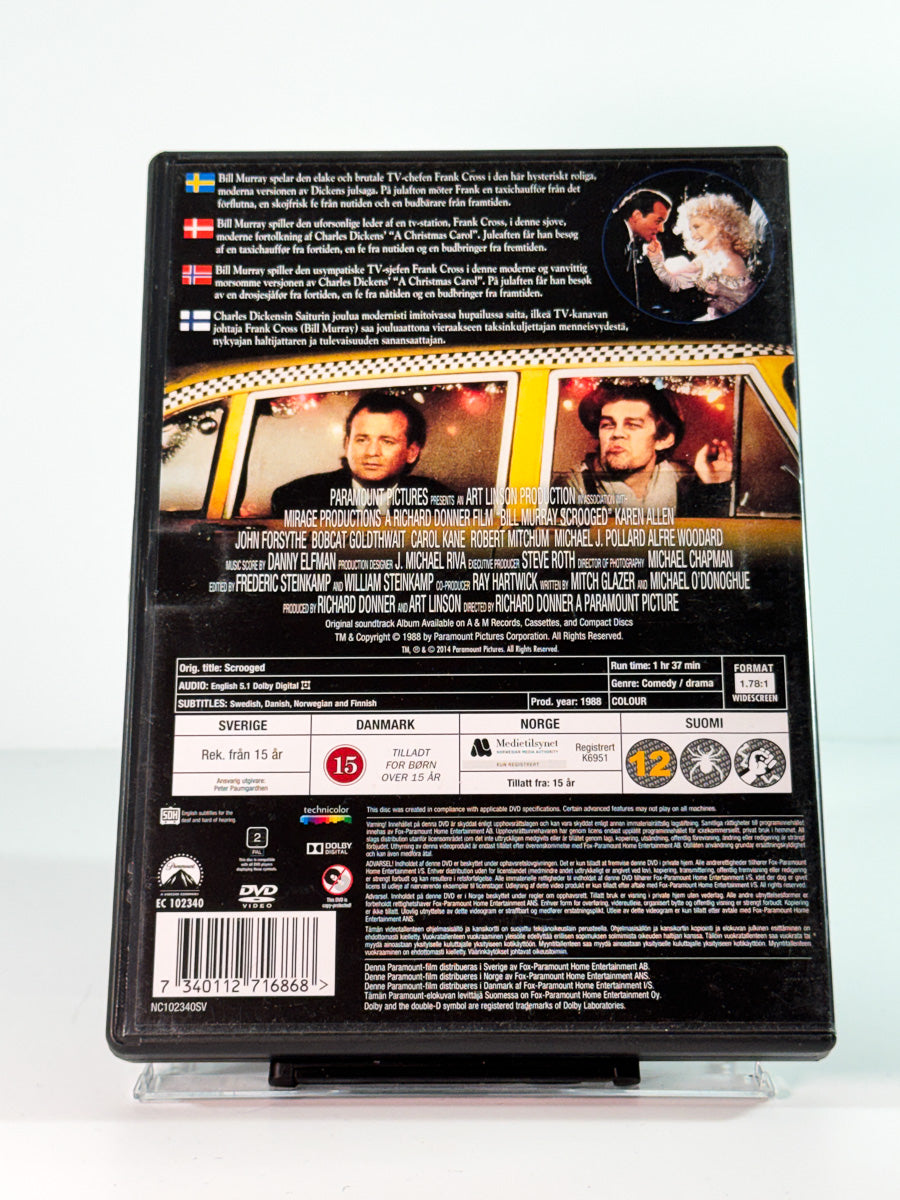 Bakside av cover til scrooged, brukt DVD hos Brukbar Film