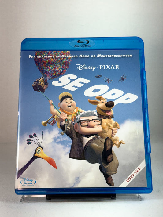Forside av Blu-ray-cover til Se opp – elsket Disney Pixar-klassiker om eventyr og vennskap, med norsk tale, brukt film hos Brukbar Film.