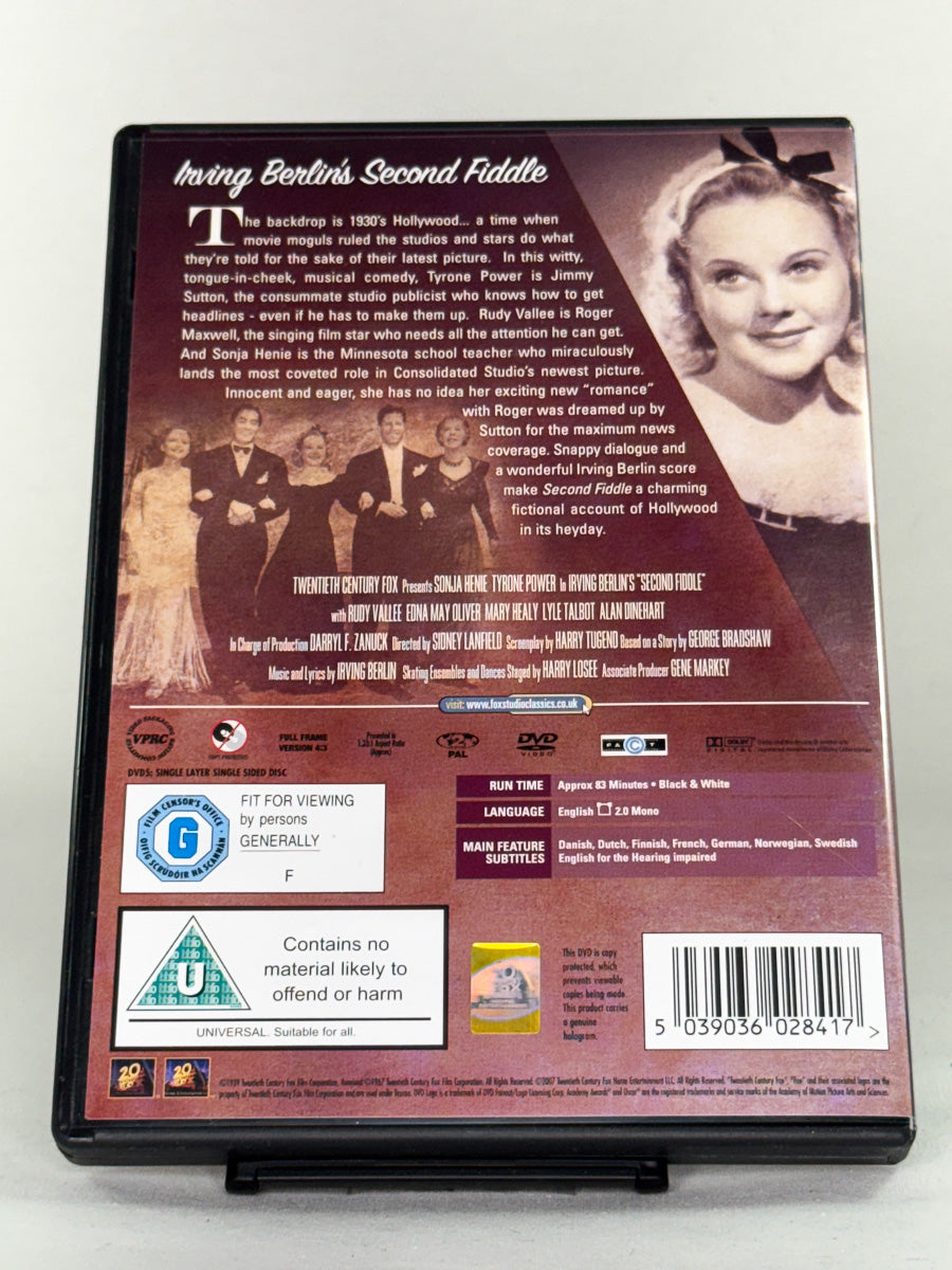 Bakside av DVD-cover til Second Fiddle – viser omtale og detaljer om Irving Berlins musikk, brukt DVD fra Brukbar Film.