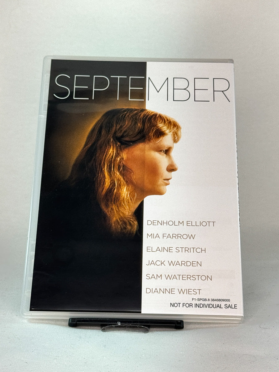 Forside av DVD-cover til September – dramatisk ensemblefilm av Woody Allen med Mia Farrow og Dianne Wiest, brukt film på DVD hos Brukbar Film.