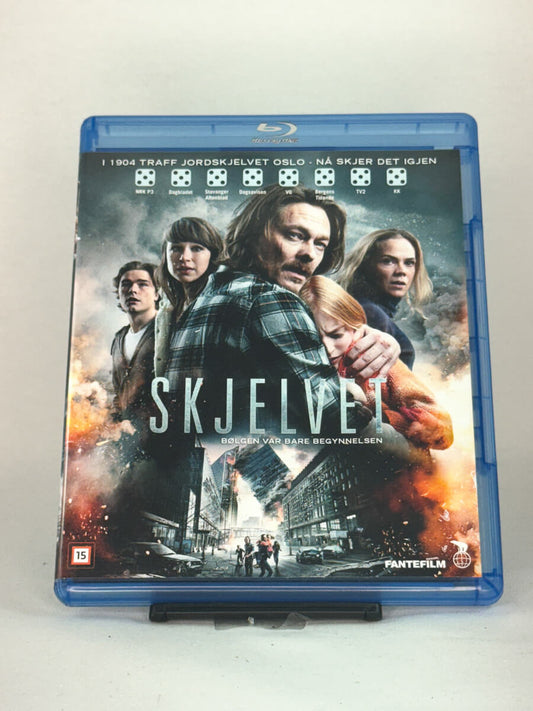 Forside av Blu-ray-cover til filmen Skjelvet – norsk katastrofefilm, brukt Blu-ray hos Brukbar Film