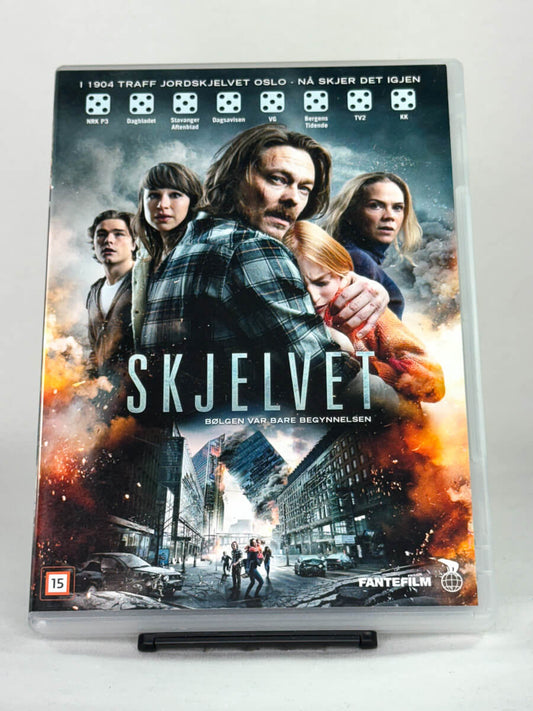Forside av DVD-cover til Skjelvet – norsk katastrofefilm fra Fantefilm med Kristoffer Joner i hovedrollen, brukt DVD tilgjengelig hos Brukbar Film
