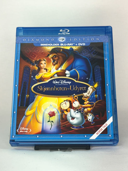 Forside av Blu-ray + DVD-cover til Skjønnheten og Udyret – Diamond Edition – eksklusiv Disney klassiker, brukt film fra Brukbar Film