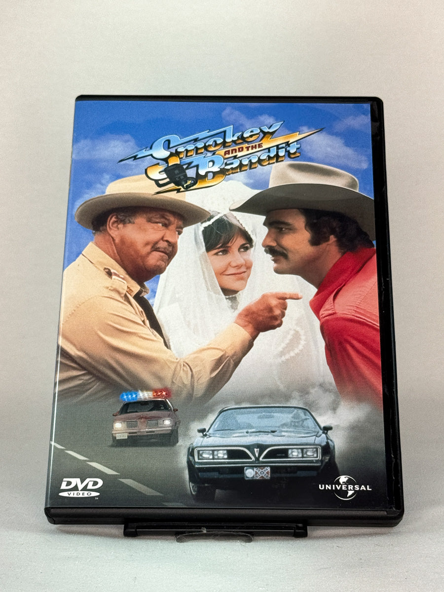 Forside av Smokey and the Bandit (1977) med Burt Reynolds, Sally Field og Jackie Gleason – brukt DVD hos Brukbar Film