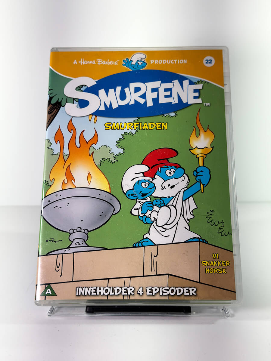 Forside av cover til Smurfene Smurfiaden, bruktfilm hos nettbutikken Brukbar Film
