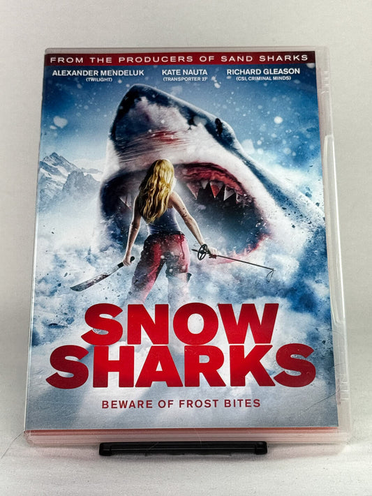 Forside av DVD-cover til filmen Snow Sharks – actionfylt grøssersatire med snø, hai og overlevelse i kulden, brukt DVD fra Brukbar Film.