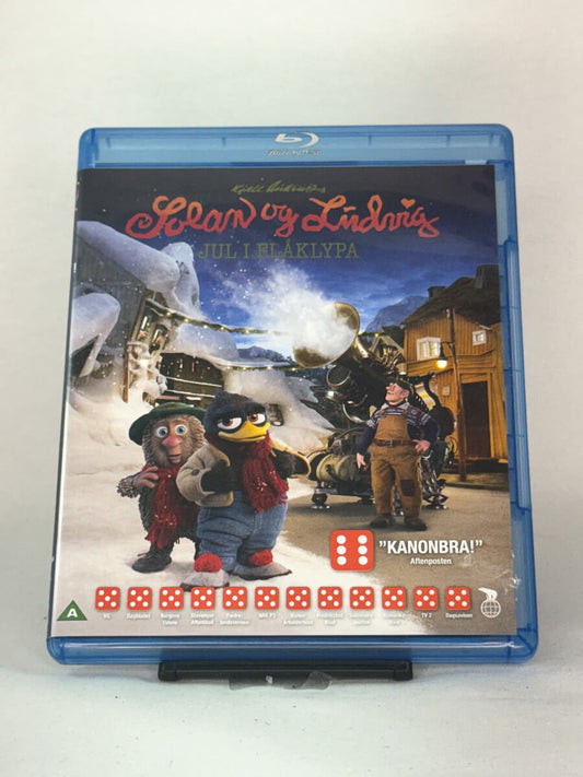 Forside av Blu-ray-cover til Solan og Ludvig – Jul i Flåklypa – norsk animasjonsklassiker for hele familien, brukt Blu-ray hos Brukbar Film