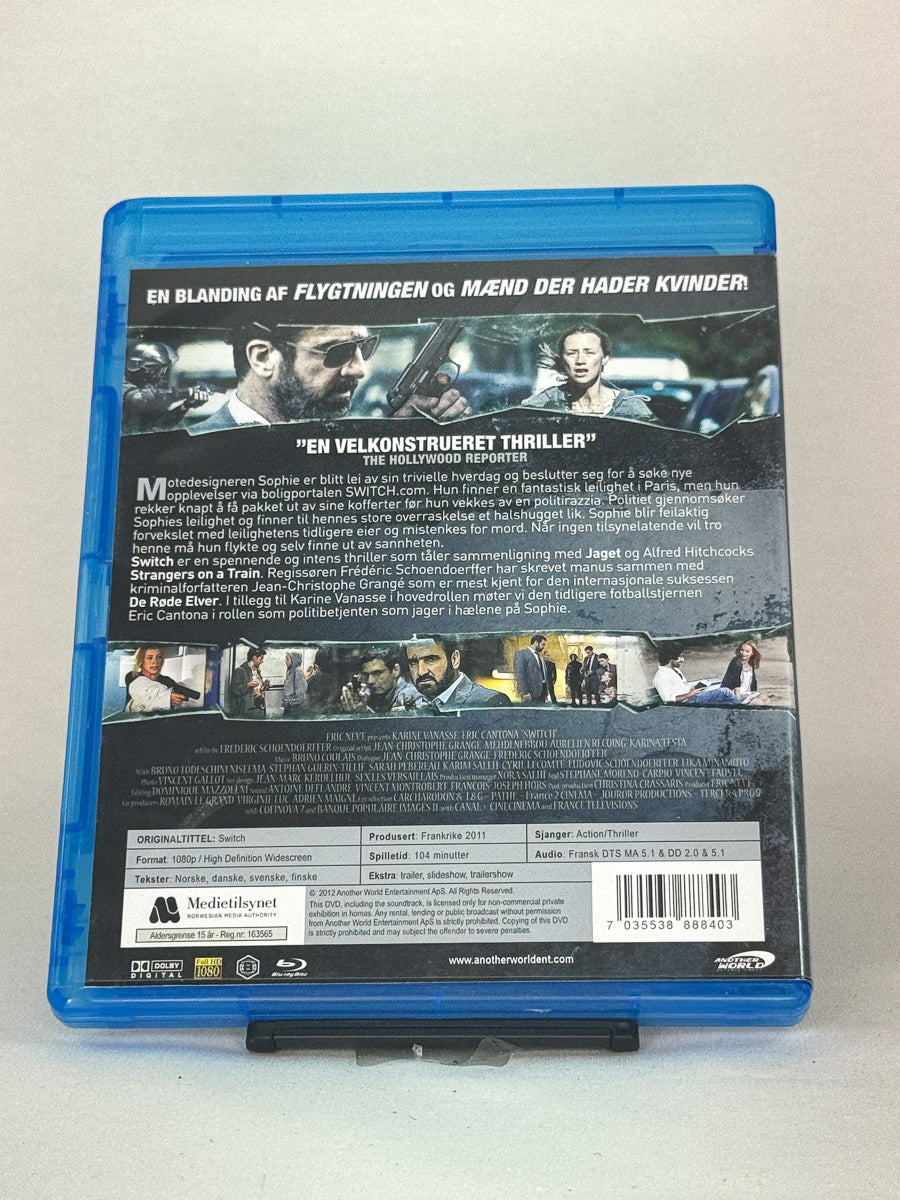 Bakside av Blu-ray-cover til Switch – intens historie fra forfatteren av De røde elvene, Blu-ray-utgave hos Brukbar Film.