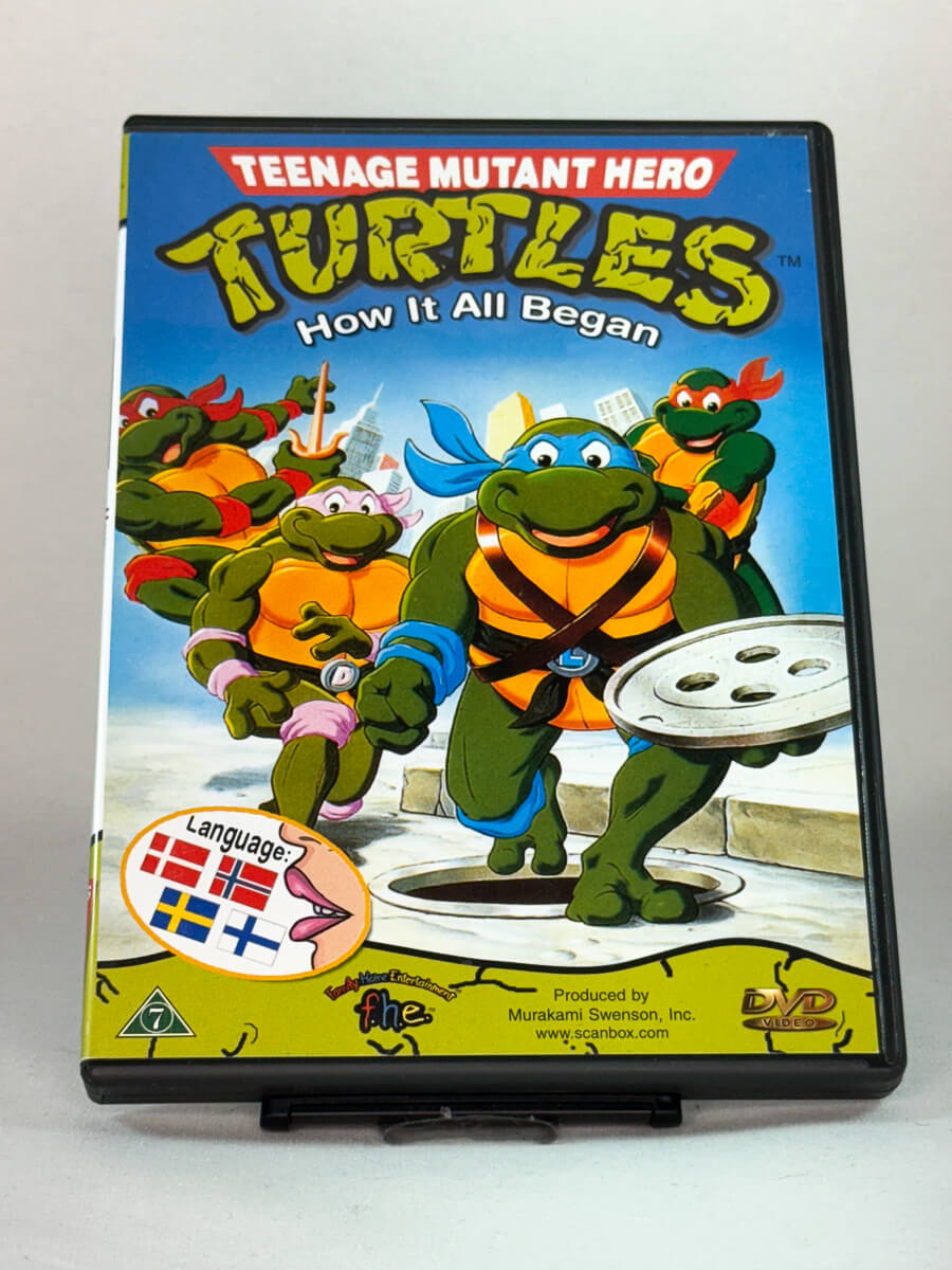 Forside av DVD-cover til Teenage Mutant Hero Turtles – How It All Began, brukt tegneserieklassiker på DVD fra Brukbar Film