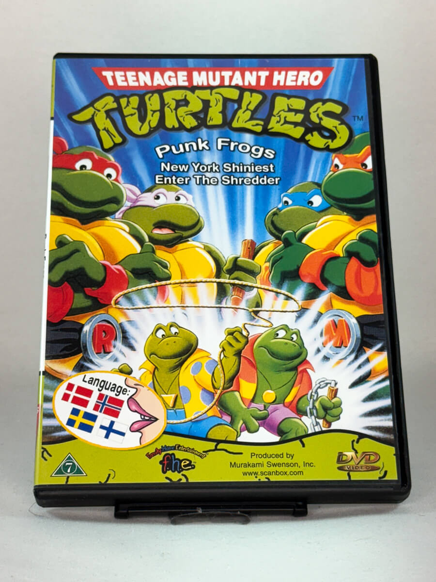 Forside av DVD-cover til Teenage Mutant Hero Turtles – Punk Frogs, brukt tegneserie-DVD fra Brukbar Film