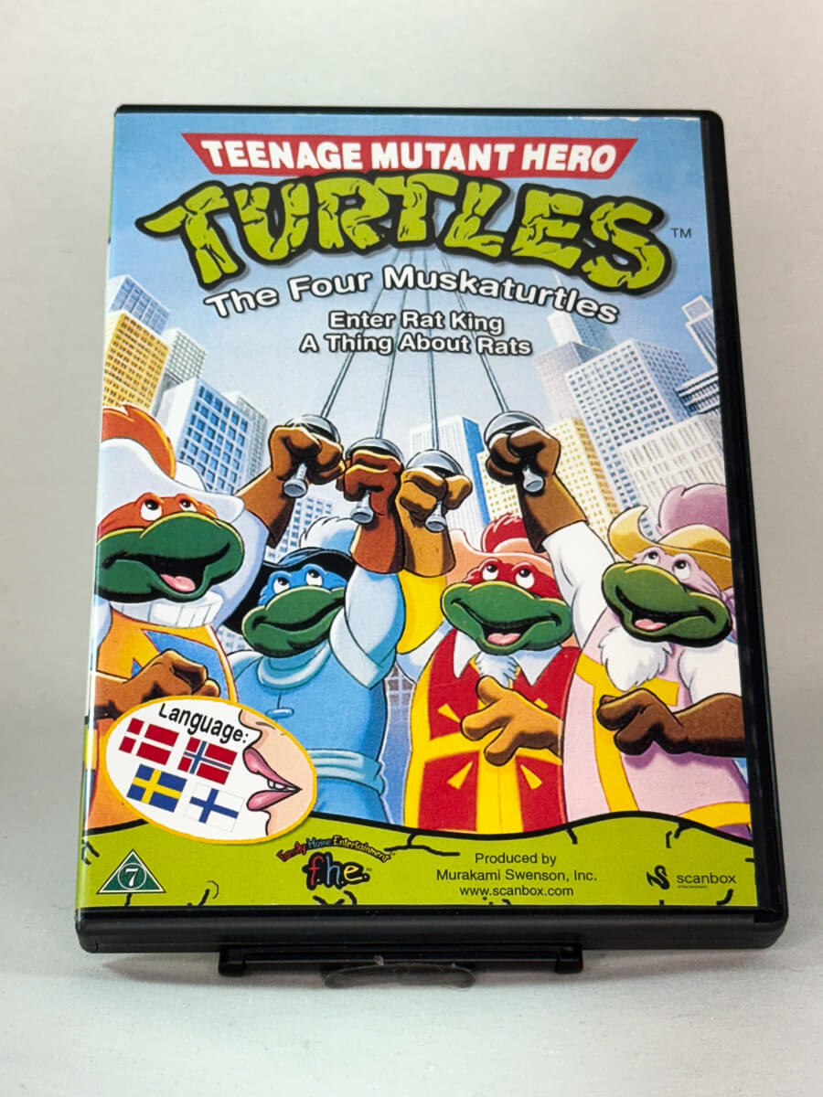 Forside av DVD-cover til Teenage Mutant Hero Turtles – The Four Muskaturtles, brukt animasjonsklassiker på DVD fra Brukbar Film