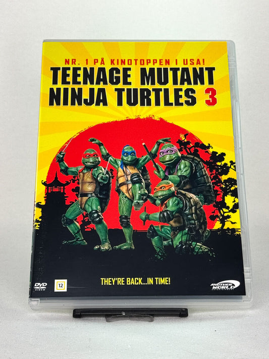Forside av DVD-cover til Teenage Mutant Ninja Turtles 3 – brukt familiefilm/klassisk actionkomedie på DVD, tilgjengelig hos Brukbar Film