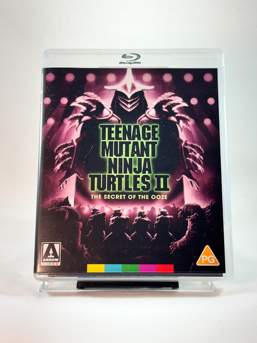 Forside av Blu-ray-cover til Teenage Mutant Ninja Turtles II: The Secret of the Ooze, Limited Arrow Video utgave - second hand Blu-ray hos nettbutikken Brukbar Film
