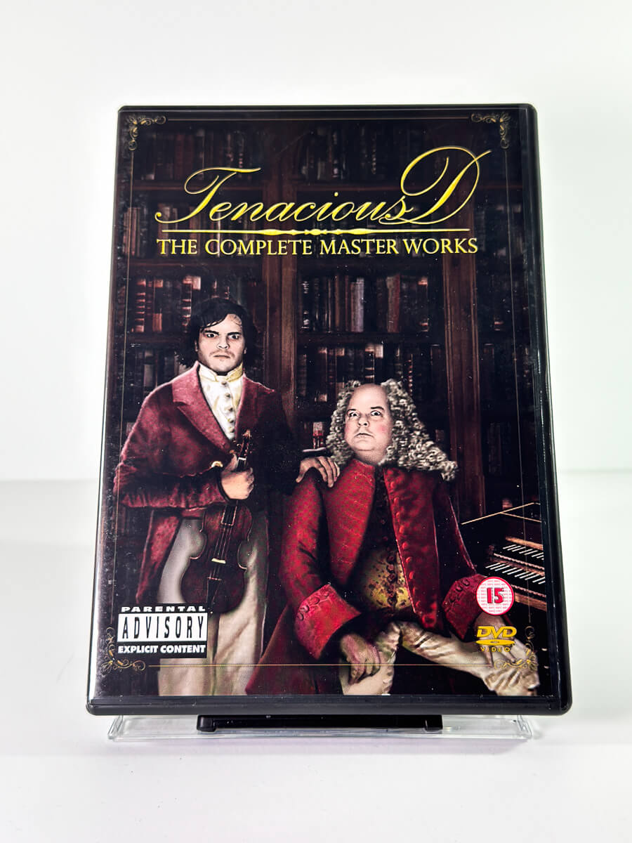 Forside av cover til Tenacious D The Complete Master Works, bruktfilm hos nettbutikken Brukbar Film