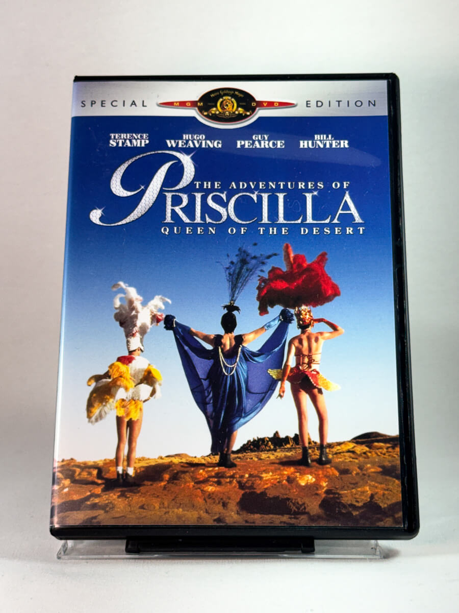 Forside av cover til The Adventures of Priscilla: Queen of the Desert, bruktfilm hos nettbutikken Brukbar Film