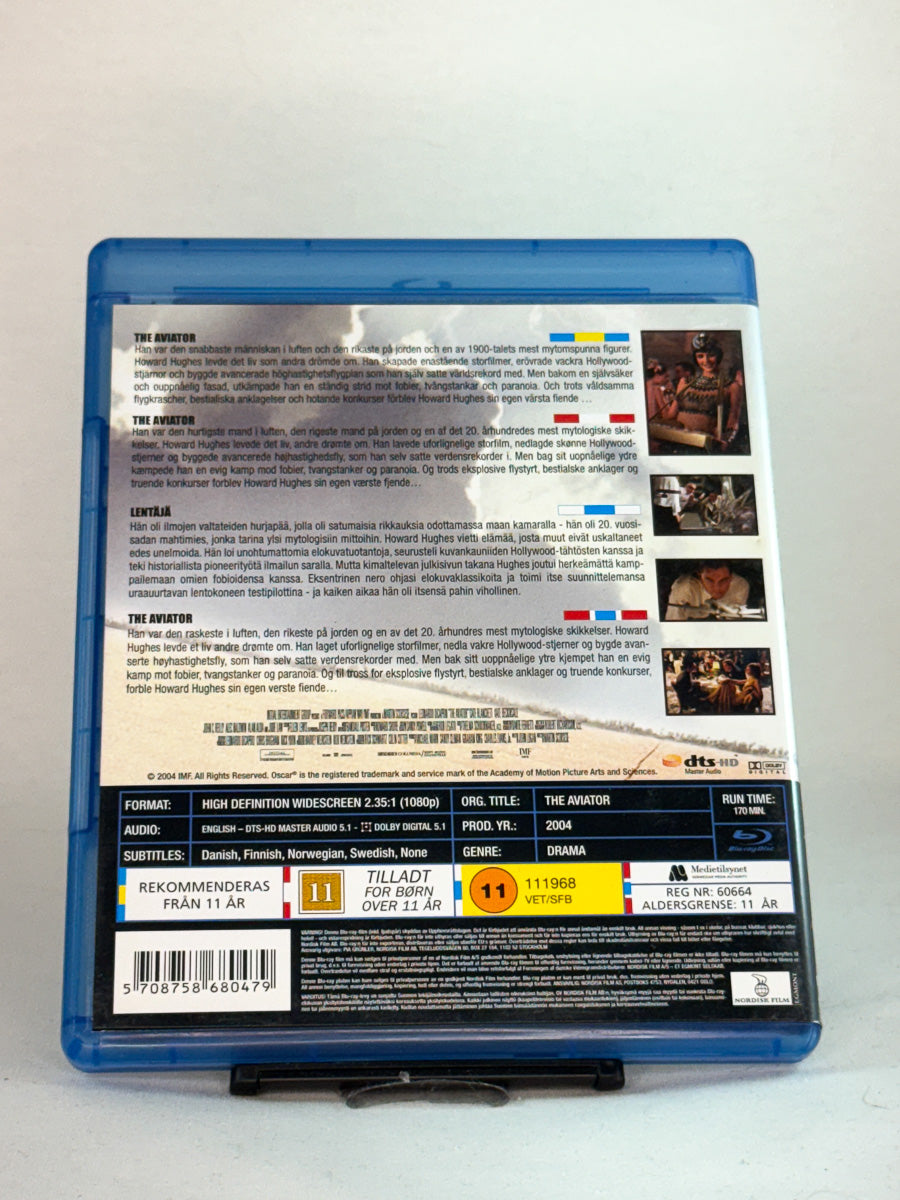 Bakside av Blu-ray-cover til The Aviator – storslått film om besettelse og genialitet, Oscar-belønnet produksjon med Cate Blanchett og Kate Beckinsale, brukt Blu-ray hos Brukbar Film.