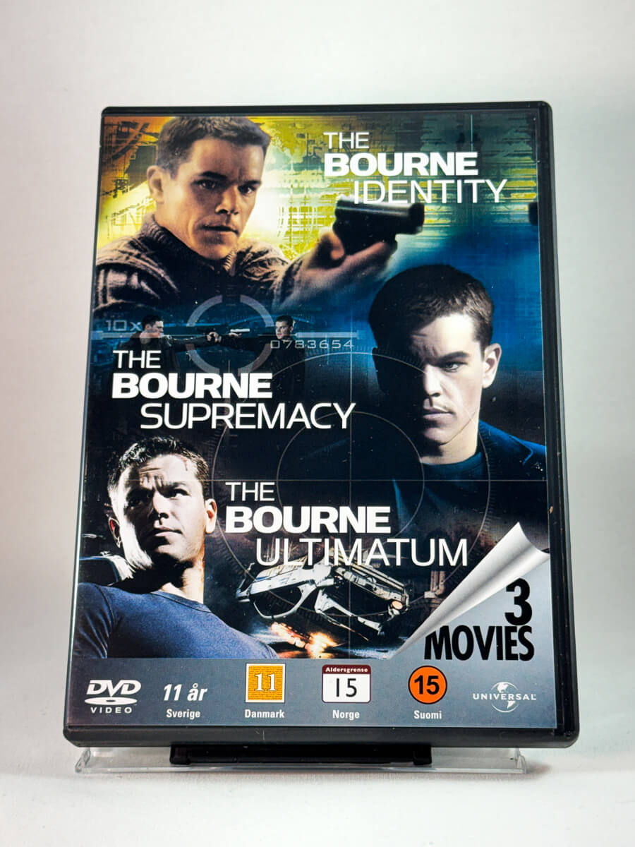 Forside av DVD-cover for The Bourne Trilogy, brukt DVD hos Brukbar Film