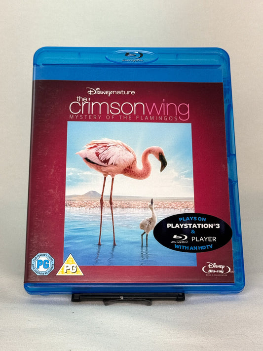 Forside av Blu-ray-cover for The Crimson Wing: Mystery of the Flamingos – naturdokumentar fra Disneynature om flamingoenes liv, brukt Blu-ray hos Brukbar Film.