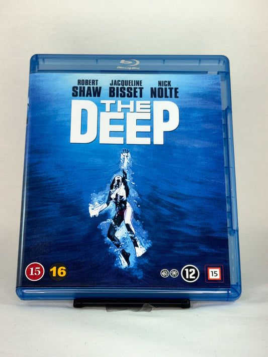 Forside av The Deep Blu-ray-cover – brukt thriller med Robert Shaw, Jacqueline Bisset og Nick Nolte, hos Brukbar Film