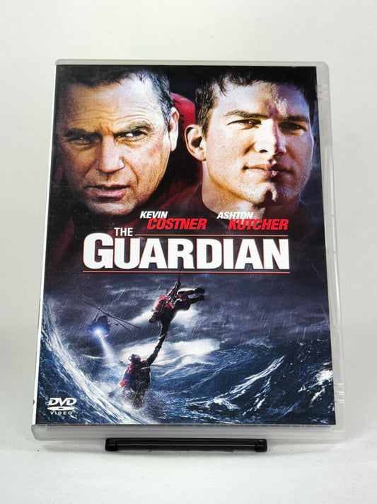 Forside av DVD-cover til The Guardian med Kevin Costner og Ashton Kutcher – actiondrama fra kystvakten – brukt DVD-film tilgjengelig hos Brukbar Film.
