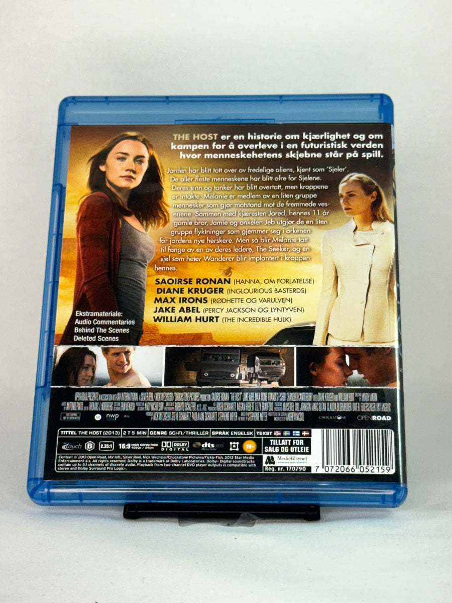 Bakside av Blu-ray-cover til The Host – fremtidsfortelling om kjærlighet og kontroll i en verden overtatt av vesener fra rommet, brukt Blu-ray-utgave hos Brukbar Film.