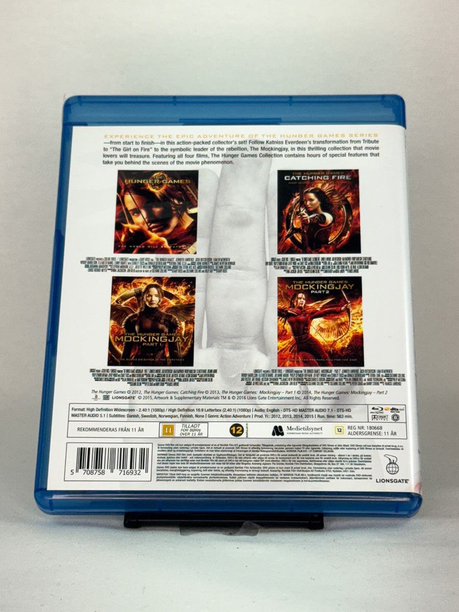 Blu-ray-cover-bakside til filmserien The Hunger Games – Complete 4-Film Collection – Brukt Blu-ray fra nettbutikken Brukbar Film