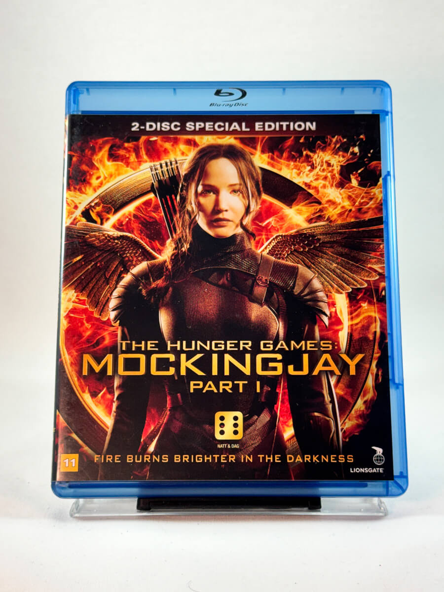 Forside av Blu-ray-cover til The Hunger Games: Mockingjay – Part 1, brukt Blu-ray hos Brukbar Film