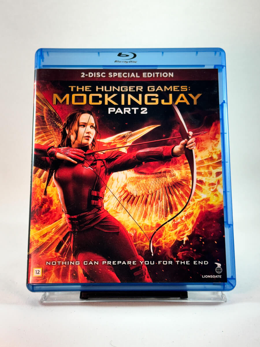 Forside av Blu-ray-cover til The Hunger Games: Mockingjay – Part 2, bruktfilm på Blu-ray hos Brukbar Film
