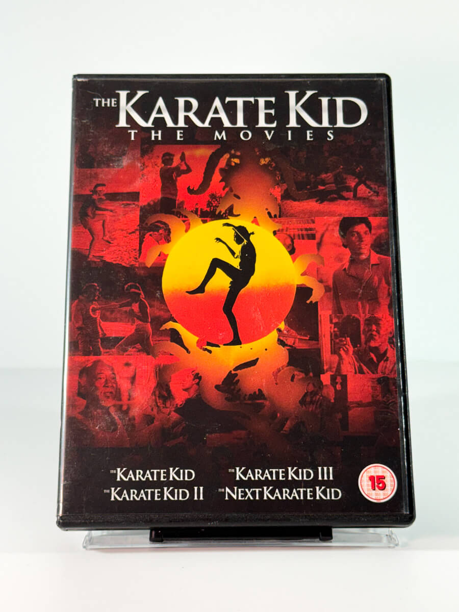 Forside av cover til the karate kid the movies, bruktfilm på DVD hos Brukbar Film