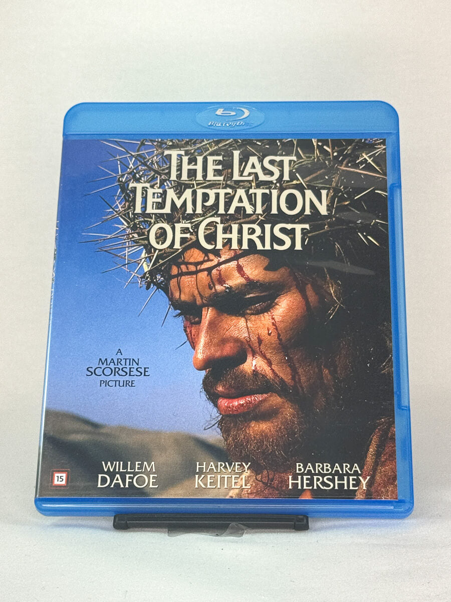 Forside av Blu-ray-cover til The Last Temptation of Christ regissert av Martin Scorsese, med Willem Dafoe – kontroversielt religiøst drama, brukt Blu-ray hos Brukbar Film.