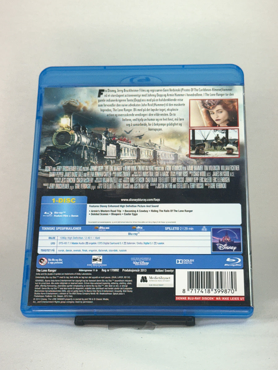 Bakside av Blu-ray-cover til The Lone Ranger – storslått westernaction med humor og eventyr, brukt Blu-ray hos Brukbar Film.