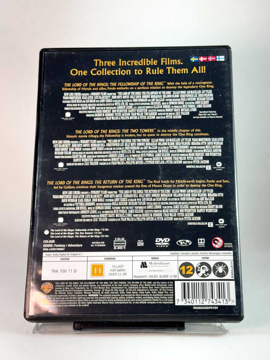 Bakside av cover til The Lord of the Rings – Theatrical Versions: 3-Film Collection, brukt original DVD hos Brukbar Film