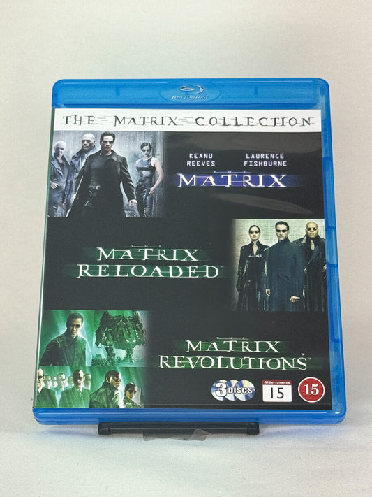 Brukt Blu-ray-samleboks The Matrix Collection – forside av originalt filmcover, kjøp brukte Blu-ray action- og sci-fi-filmer hos Brukbar Film