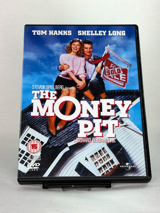 Forside av DVD-cover til The Money Pit – kaoskomedie med Tom Hanks og Shelley Long, produsert av Steven Spielberg, brukt DVD hos Brukbar Film.