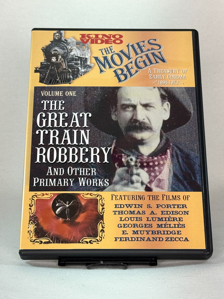 Forside av DVD-cover til The Movies Begin Vol. 1 – The Great Train Robbery and Other Primary Works, brukt film tilgjengelig hos Brukbar Film