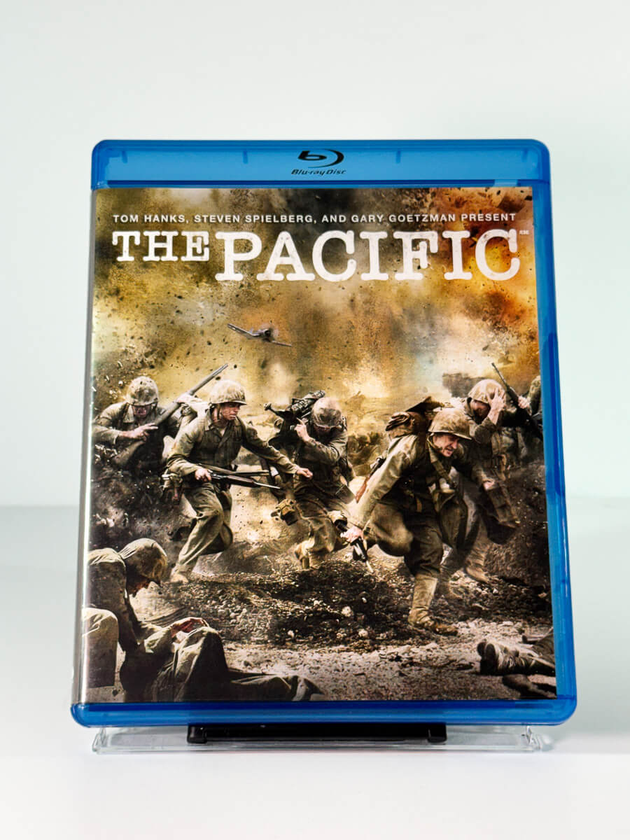 Forside av cover til The Pacific, brukt Blu-ray hos Brukbar Film