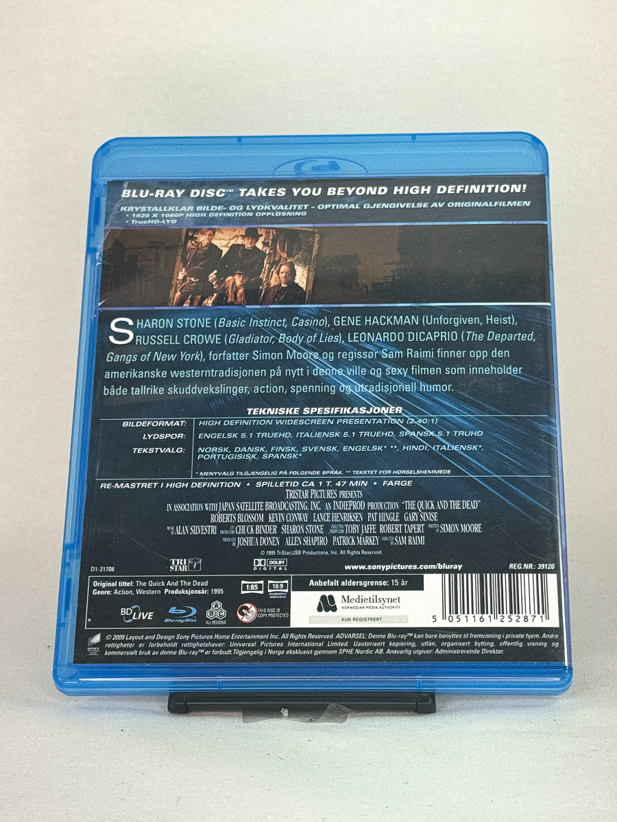 Bakside av Blu-ray-cover til The Quick and the Dead – duellfylt westernregi av Sam Raimi med stjernespill og klassisk hevnplot, second hand Blu-ray-film fra Brukbar Film.