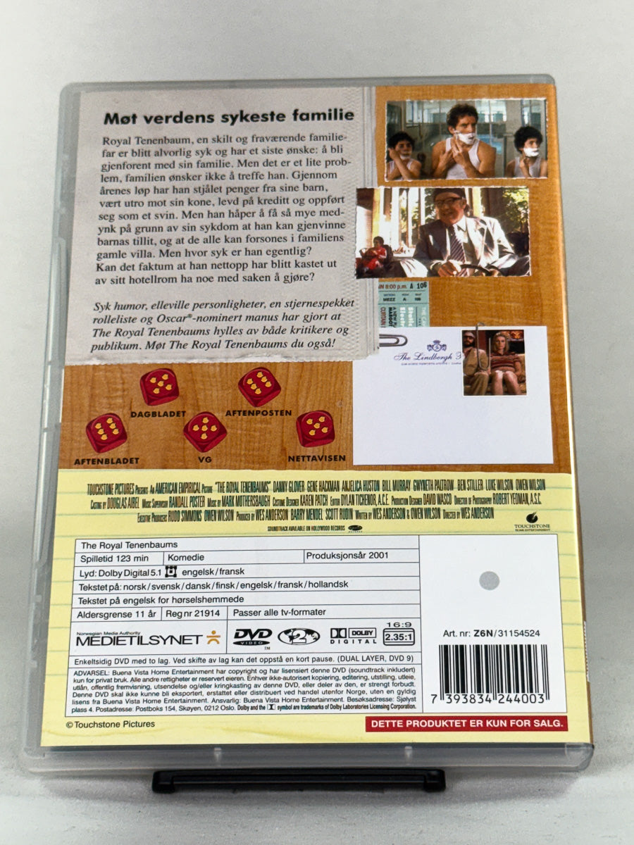 Bakside av DVD-cover til The Royal Tenenbaums med oversikt over rollefigurer og filmfakta; brukt DVD hos Brukbar Film.