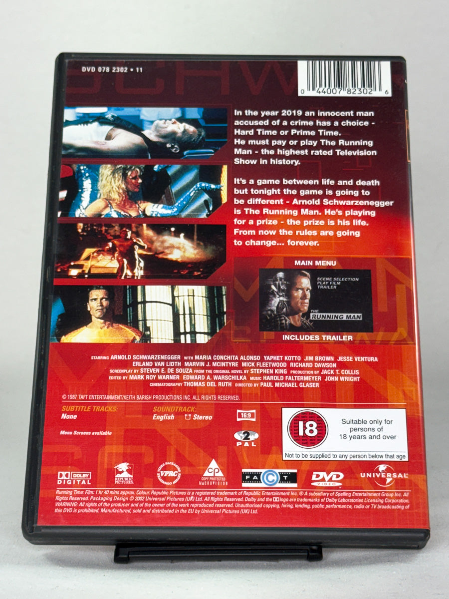 Bakside av DVD-cover til The Running Man – 80-tallsklassiker med Arnold Schwarzenegger i et dødelig gameshow, original brukt DVD hos Brukbar Film.