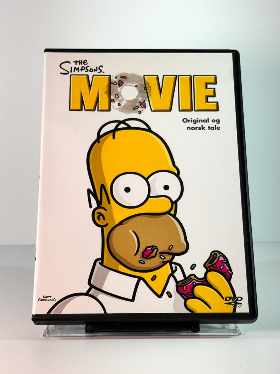 Forside av cover til The Simpsons Movie, brukt DVD hos Brukbar Film
